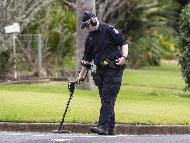 Investigators at a police incident in Harristown, Friday, May 6, 2022. Picture: Kevin Farmer