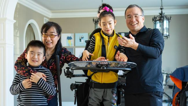 Genetic researchers and neuroscientists Dr Soo-Kyung Lee (left) and Jae Lee (right) with their son, Joon, and daughter, Yuna.