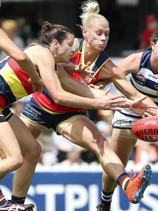 Now Adelaide Crows teammates, Jess Foley and Erin Phillips compete for the ball in the midfield. Picture: Sarah Reed