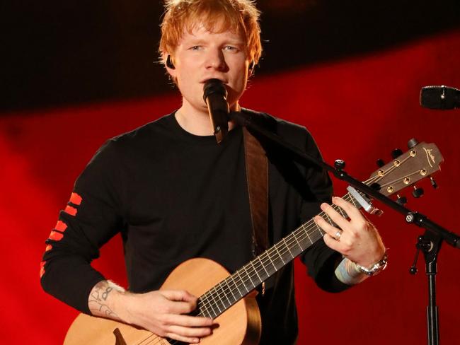 Ed Sheeran says he wishes he had a six-pack like other pop stars. Picture: Marc Piasecki/Getty Images For Global Citizen