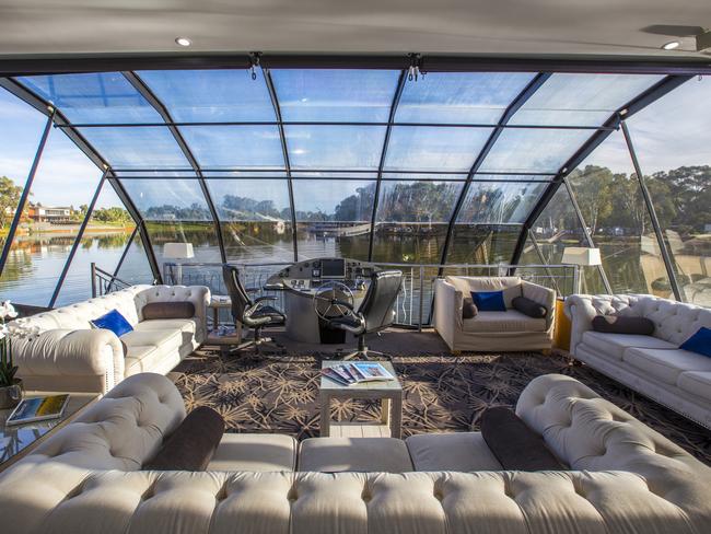 All aboard the floating mansion on the Murray