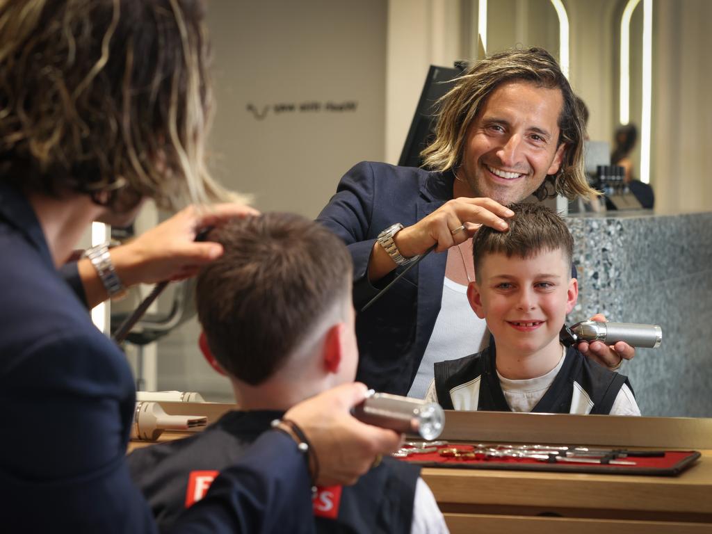 Scandizzo giving Archie a Nick Daicos style cut. Picture: David Caird
