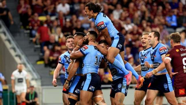 Daniel Saifiti celebrates scoring a try. Picture: Adam Head