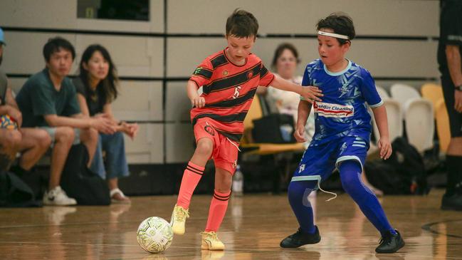 Sam Corbett (L) and Julian Padayachey as Storm FC V Galaxy FC at the Gold Coast International Futsal Championships  at Carrara.Picture: Glenn Campbell