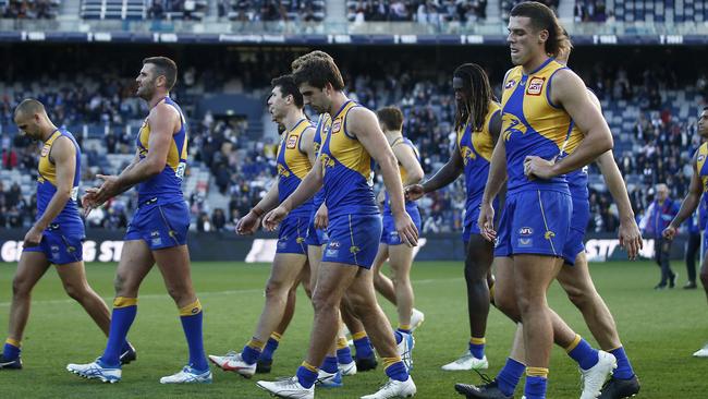 Eagles players look dejected as they leave GMHBA Stadium. Picture: Getty Images