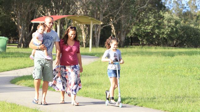 A family enjoys the Tallebudgera parklands.