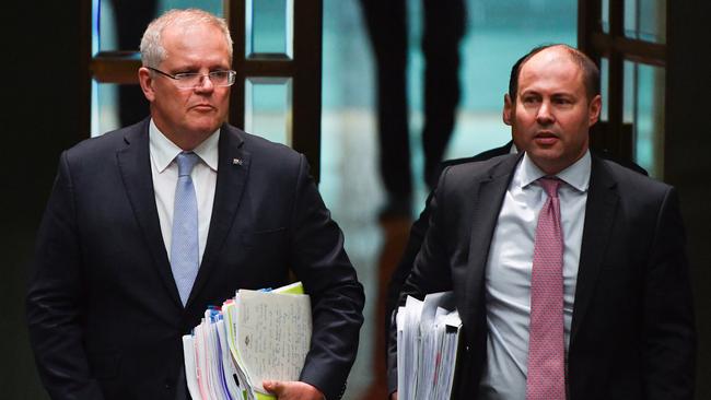 Prime Minister Scott Morrison and Treasurer Josh Frydenberg arrive for question time at Parliament House in Canberra on Thursday. Picture: AAP