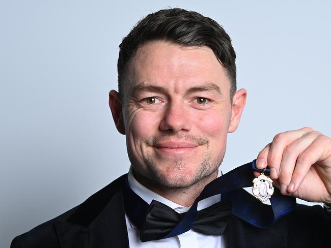 BRISBANE, AUSTRALIA - SEPTEMBER 25: Lachie Neale of the Lions poses for portraits with the Brownlow Medal during the 2023 Brownlow Medal at The Gabba on September 25, 2023 in Brisbane, Australia. (Photo by Albert Perez/AFL Photos via Getty Images)