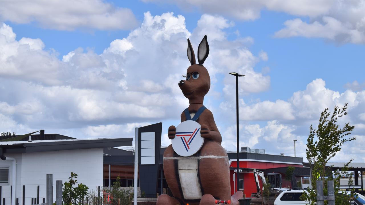 Matilda the Kangaroo appears outside a mega servo.