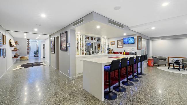 This stunning Kings Beach mansion at 15B Burgess Street is being marketed by Henzells with offers over $7m being sought.