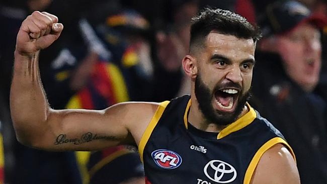 ADELAIDE, AUSTRALIA - JULY 30: Wayne Milera of the Crows celebrates a goal reviewed to be touched during the round 20 AFL match between the Adelaide Crows and the Carlton Blues at Adelaide Oval on July 30, 2022 in Adelaide, Australia. (Photo by Mark Brake/Getty Images)