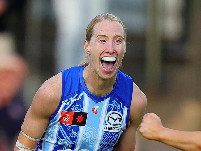 ADELAIDE, AUSTRALIA - OCTOBER 25:Kate Shierlaw of the Kangaroos .celebrates a goal with Jenna Bruton during the 2024 AFLW Round 09 match between Kuwarna (Adelaide Crows) and the North Melbourne Tasmanian Kangaroos at Norwood Oval on October 25, 2024 in Adelaide, Australia. (Photo by Sarah Reed/AFL Photos via Getty Images)