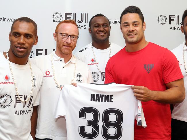 Fiji coach Ben Ryan (second from left) meets Jarryd Hayne with other members of his team.