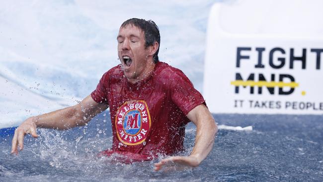 A nice cold one: Bob Murphy in the drink. Picture: AAP Image/Daniel Pockett