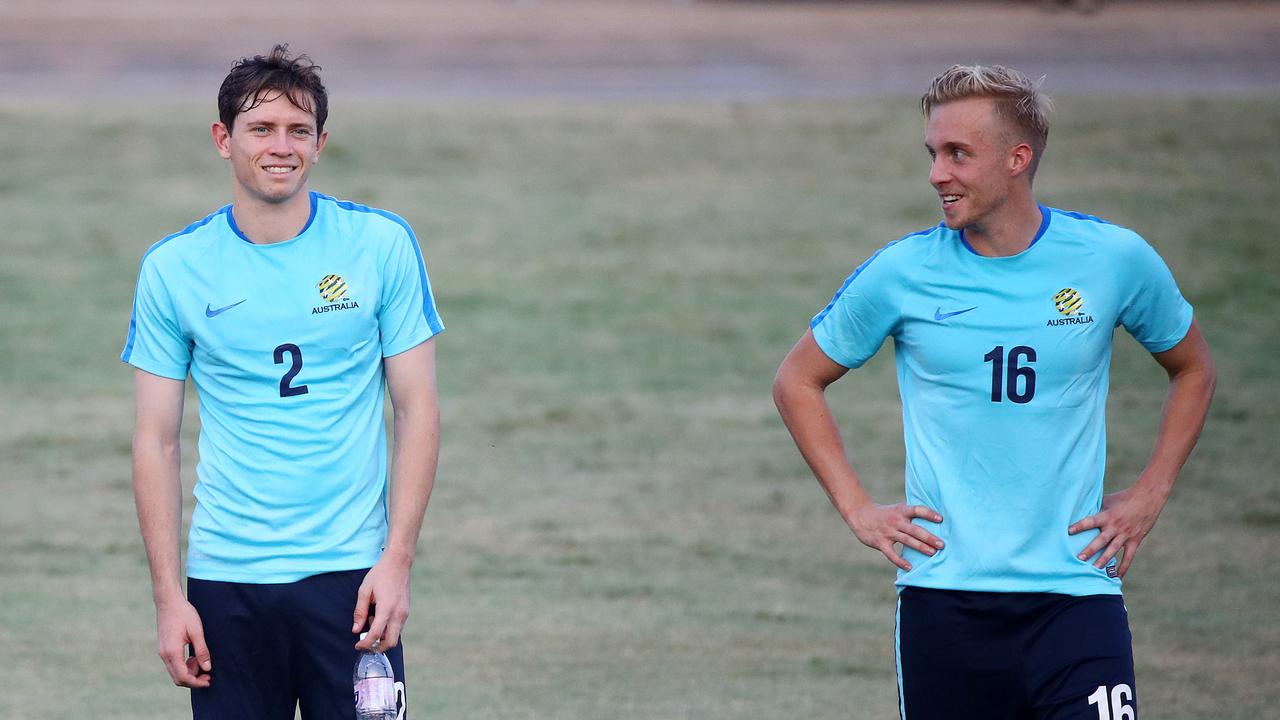 James Jeggo (R) is back in the Socceroos squad for the first time in 12 months, while the in-form Craig Goodwin has been named as a ‘train-on player’