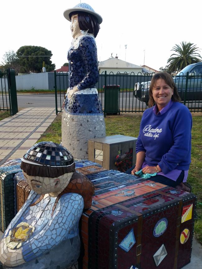 Karen Carr with Dulcie and Chook outside the toilet block.