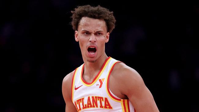 NEW YORK, NEW YORK - DECEMBER 11: Dyson Daniels #5 of the Atlanta Hawks celebrates a shot during the second half of the quarterfinal game of the Emirates NBA Cup at Madison Square Garden on December 11, 2024 in New York City. The Atlanta Hawks defeated the New York Knicks 108-100 to advance to the semifinal round. NOTE TO USER: User expressly acknowledges and agrees that, by downloading and or using this photograph, User is consenting to the terms and conditions of the Getty Images License Agreement.   Elsa/Getty Images/AFP (Photo by ELSA / GETTY IMAGES NORTH AMERICA / Getty Images via AFP)