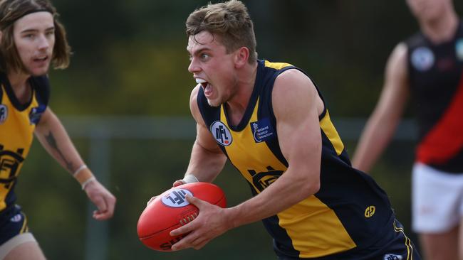 Tom Simpson in action for Hurstbridge. Picture: Stuart Milligan