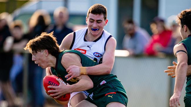 Ethan Borys lays a tackle for the Geelong Falcons. Picture: Linda Higginson