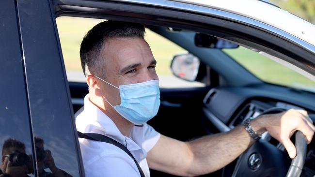 Opposition Leader Peter Malinauskas drives through the Victoria park Covid testing site after having a close contact with former Premier Jay Weatherill. Photo Kelly Barnes