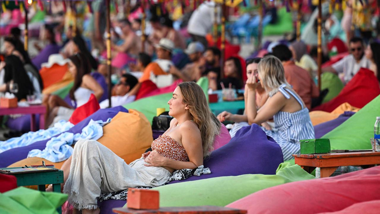 Australians in Bali are being urged to behave amid a crackdown on tourists. Pictures: Sonny Tumbelaka / AFP