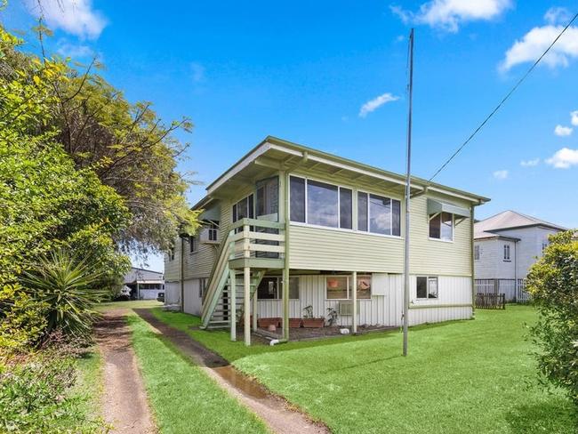 This five-bedroom home is high and dry and has long-term tenants in place.