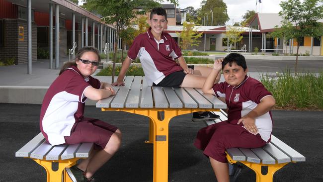 Students Tori-Lee Stubbs, Barry Akkary and Naqi Amiri. Picture: Simon Bullard