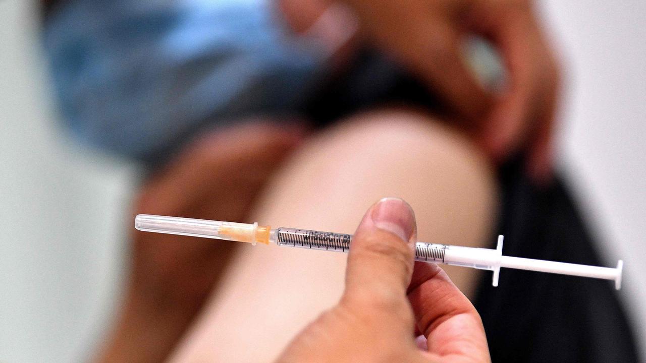 A resident receives his first dose of the AstraZeneca vaccine at a walk-in Covid-19 vaccination centre. Picture: Saeed Khan/AFP