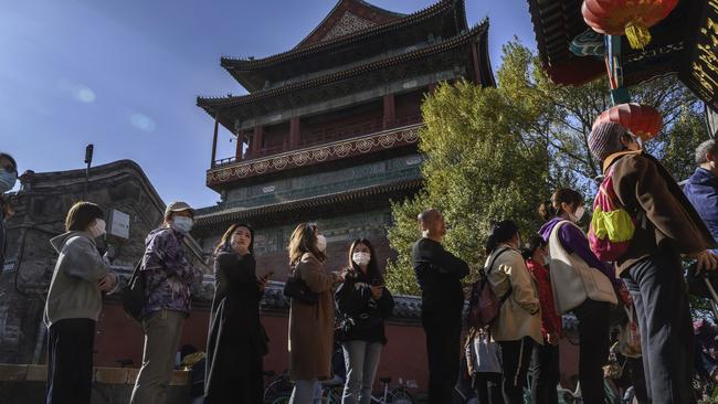 People line-up outside local restaurant Yaoji Chaogan where then Vice President Joe Biden ate a meal in 2011 during a visit to Beijing. Picture: Getty Images