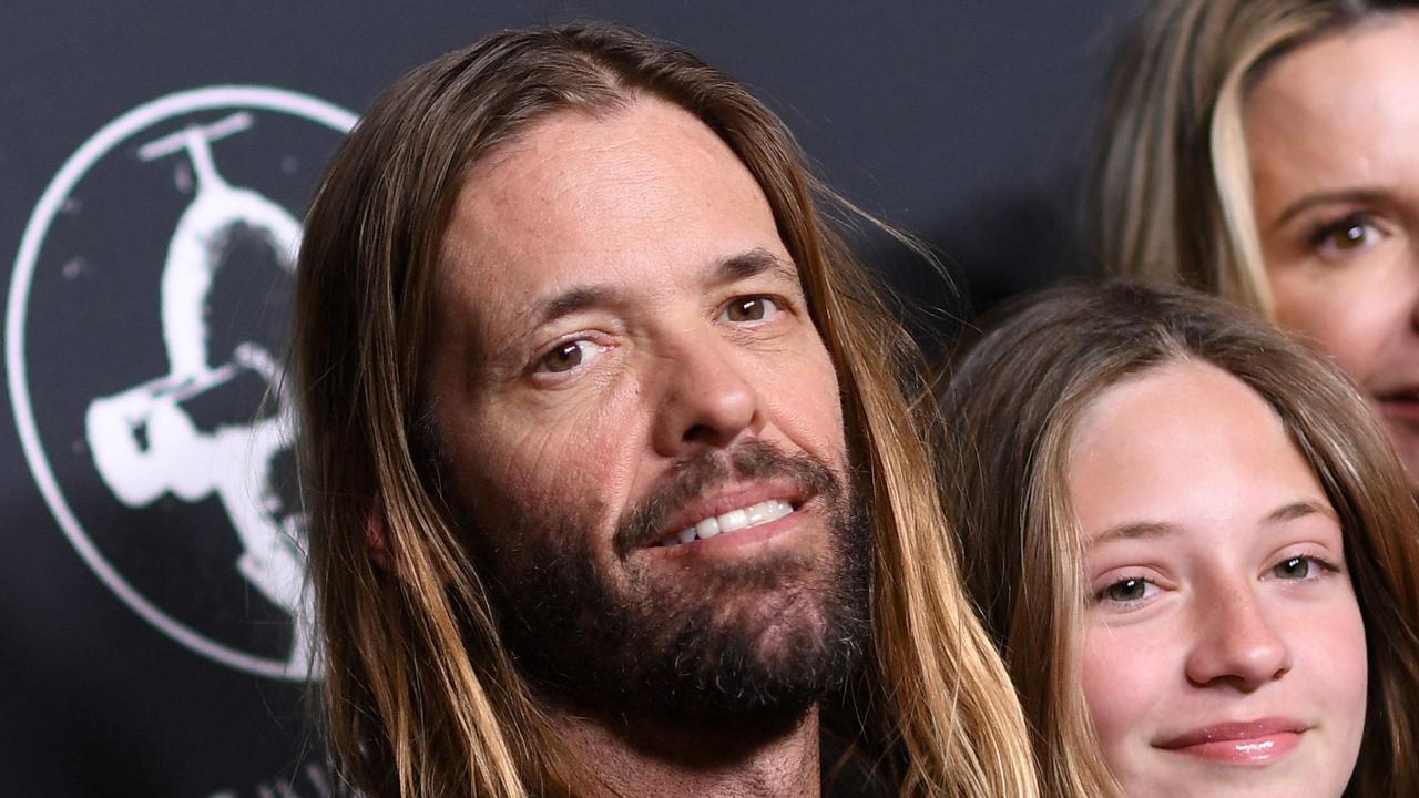 Taylor Hawkins with his daughter and wife at the premiere of Studio 666 at the TCL Chinese Theater in Hollywood last month. Picture: AFP