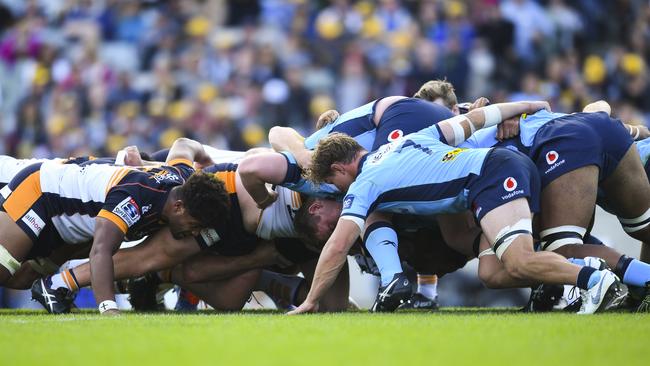 Brumbies and Waratahs players pack a scrum on Sunday afternoon in the last Super Rugby match before the competition goes into suspension. Picture: AAP