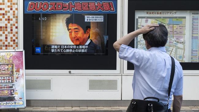 News of Mr Abe’s death is broadcast in Tokyo.