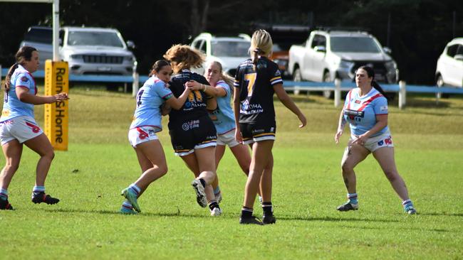 Nakiah-Jayde Smith &amp; Abbey Montgomery make a tackle for the Milton-Ulladulla Bulldogs Open Women's Tackle team. Picture: Supplied