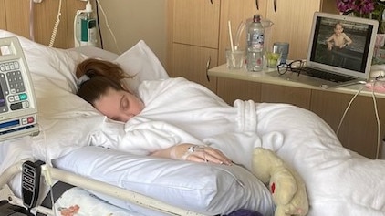 Amy in hospital in October 2021, three months after her first Pfizer shot.