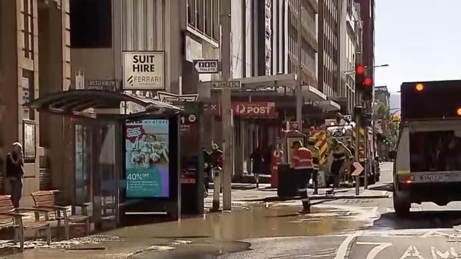 The clean-up is the second in two days after a water main in Grenfell Street burst on Sunday. Picture: 7 NEWS