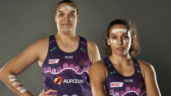 Firebirds’ two Indigenous players Donnell Wallam (left) and Jemma Mi Mi try on their First Nations outfits. Picture: Queensland Firebirds