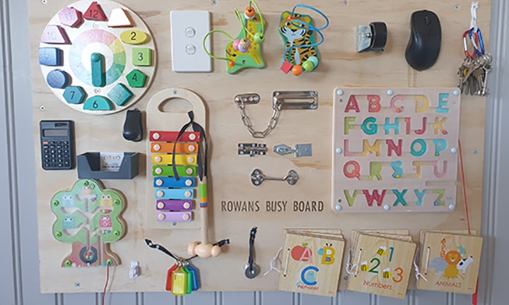 Mum builds busy board for toddler with materials from Kmart and Bunnings