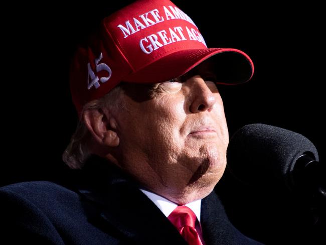 US President Donald Trump uses a backup microphone while speaking during a Make America Great Again rally at Kenosha Regional Airport November 2, 2020, in Kenosha, Wisconsin. (Photo by Brendan Smialowski / AFP)