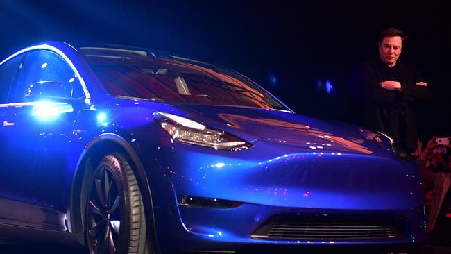 Tesla CEO Elon Musk with the new Tesla Model Y at its unveiling last month. Pic: AFP