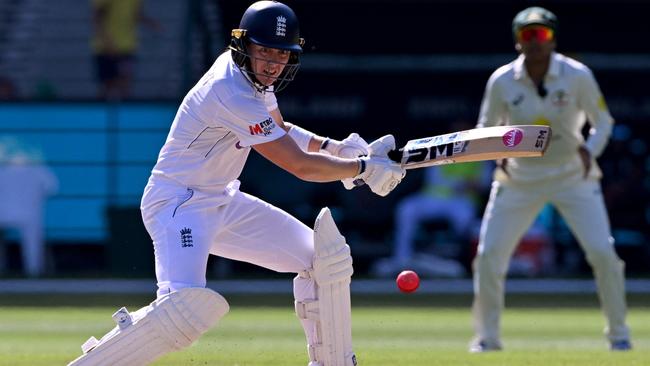 England's Heather Knight plays a shot on the third day of the Women's Ashes cricket Test match between Australia and England at the Melbourne Cricket Ground (MCG) in Melbourne on February 1, 2025. (Photo by William WEST / AFP) / --IMAGE RESTRICTED TO EDITORIAL USE - STRICTLY NO COMMERCIAL USE--