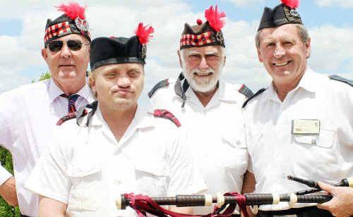 The Heritage Highlander Pipe Band’s Andrew Robinson, Jim Gillespie, Lionel Devine and Neil Burley.