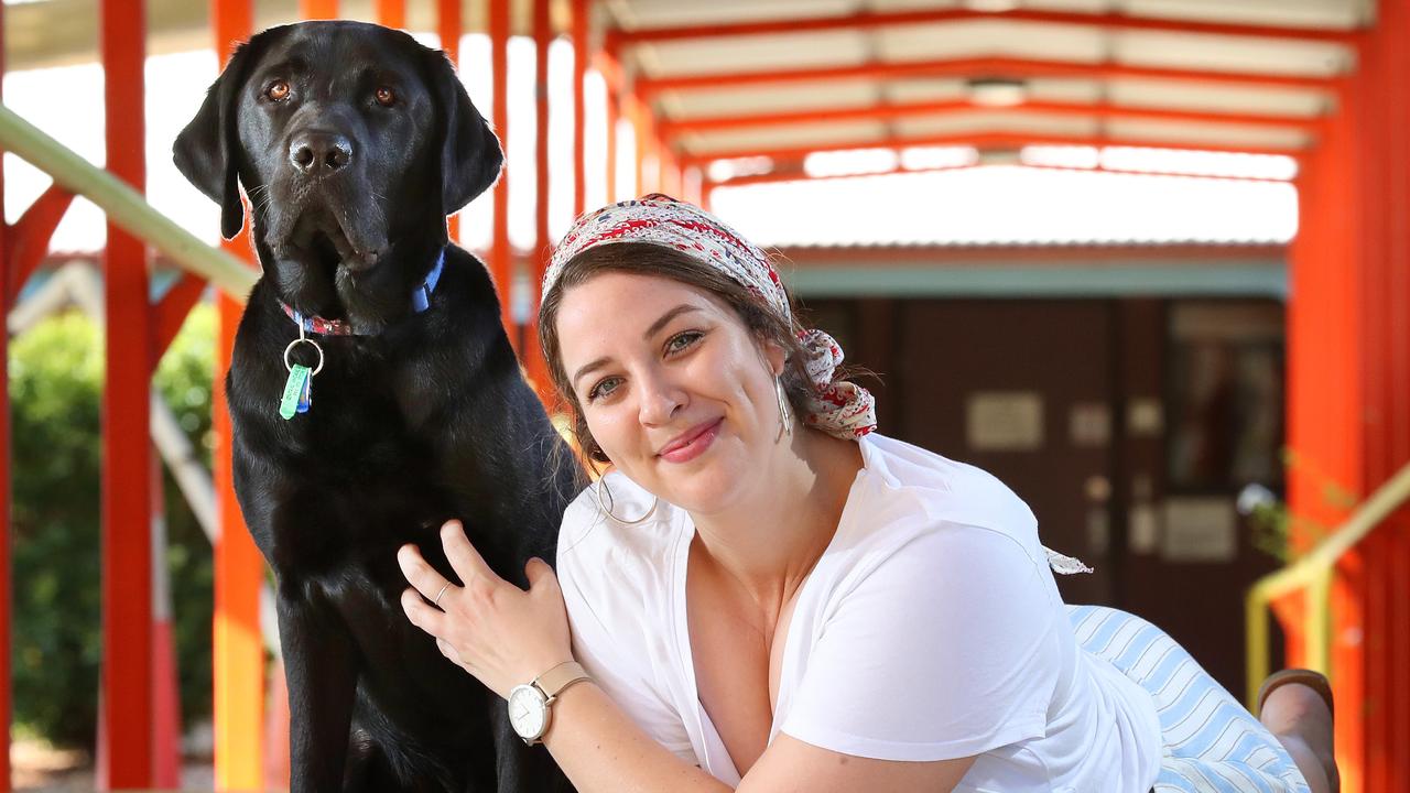 Ebony Bunz, 26 of Deception Bay, with Victor the purebred Labrador Retriever. Photographer: Liam Kidston.