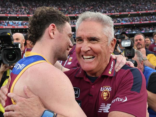 MELBOURNE , AUSTRALIA. September 28, 2024. AFL Grand Final between the Brisbane Lions and Sydney Swans at the MCG. Brisbane Lions coach Chris Fagan and co-captain Lachie Neale hug after the win. Picture: David Caird