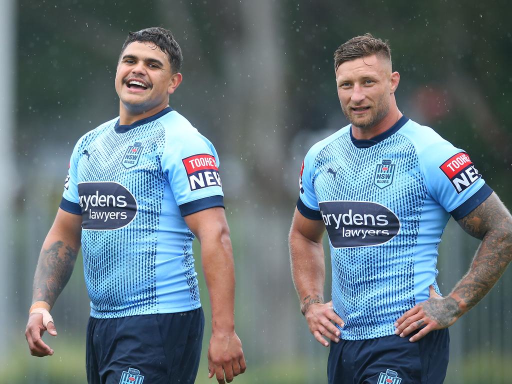 Latrell Mitchell and Tariq Sims prepare to beat the Maroons.