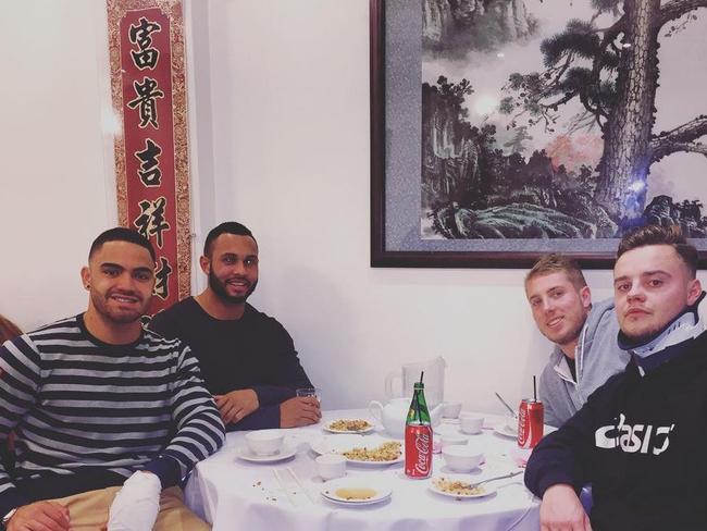 Aaron Gray and Dylan Walker pictured having dinner with friends just hours before being rushed to St Vincent's Hospital. Picture: Instagram