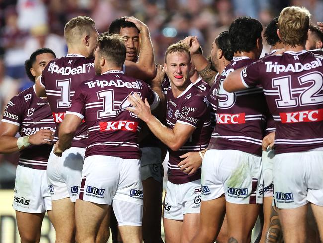 SYDNEY, AUSTRALIA - APRIL 06: DalyÃ&#130;Â Cherry-Evans (c) of the Sea Eagles celebrates with his team mates after a try during the round five NRL match between Manly Sea Eagles and Penrith Panthers at 4 Pines Park, on April 06, 2024, in Sydney, Australia. (Photo by Cameron Spencer/Getty Images)