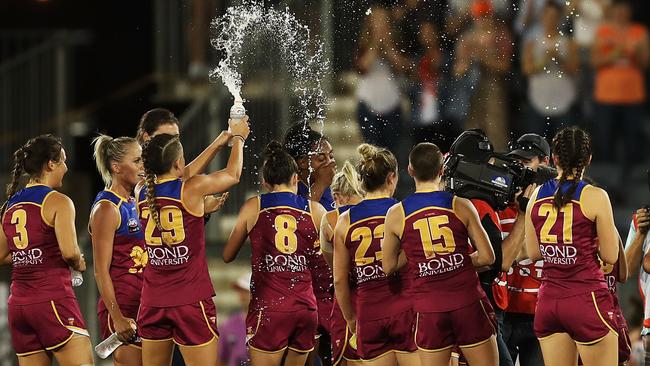 Brisbane players celebrate after Friday’s win over GWS. Picture: Getty Images