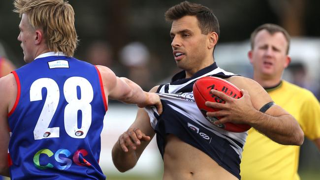 Sam Lloyd in action for Bundoora. Picture: Stuart Milligan