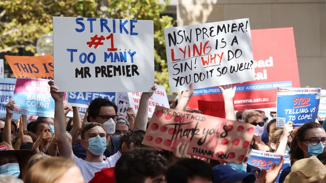 SYDNEY, AUSTRALIA - NewsWire FEBRUARY 15, 2022: Nurses from across Sydney gathered in front of NSW Parliament today to protest staff shortages and wages. Picture: NCA NewsWire / David Swift