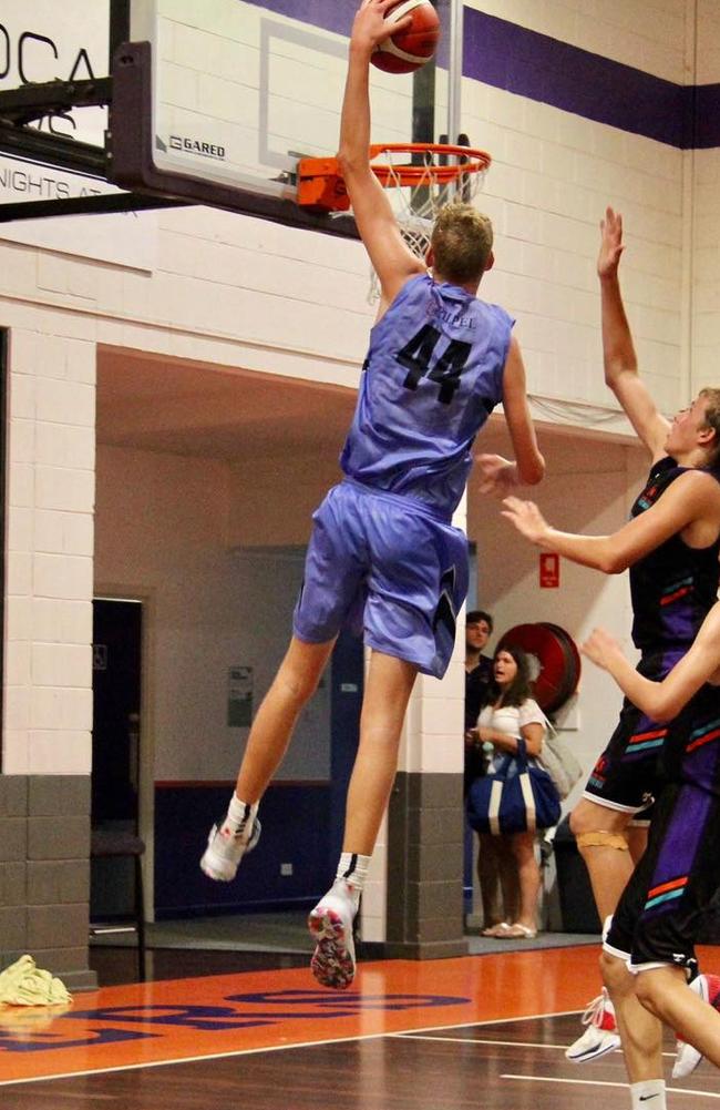 Northside Wizards star big man Rocco Zikarsky dunking the ball with ease during an under-16s game. Picture: Julie Morrison